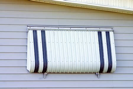 protect  home  water wind damage  storm shutters