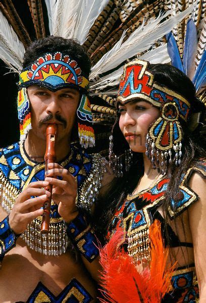 musicians in mexican aztec indian traditional costumes in los angeles california usa photo