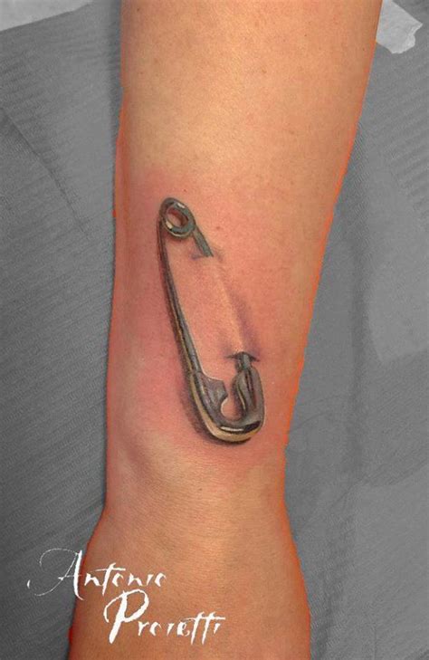 realistic safety pin ripped skin wrist tattoo penguin tattoo safety pin tattoo tattoos