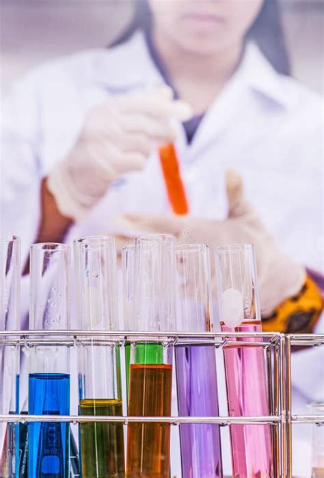 scientist mixing chemicals stock photo image  technology