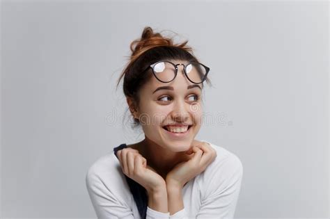 pretty girl with glasses on the forehead have wide smile stock image