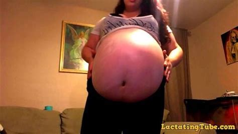 watch massive pregnant woman in tight clothes mom kink belly porn