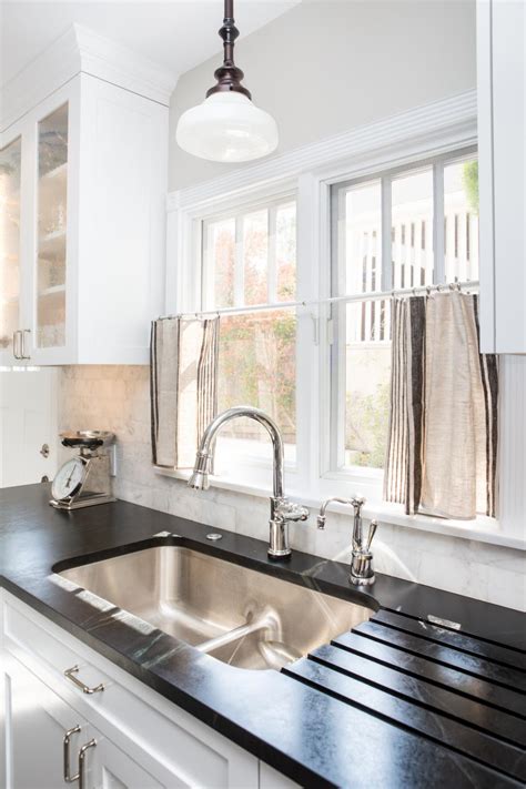 stainless steel sink soapstone countertops  farmhouse kitchen hgtv