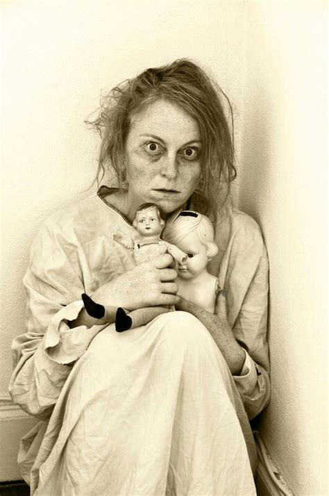 Woman With Two Dolls In An Institution Psychiatric Ward Insane