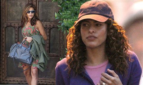 eva mendes looks unrecognisable with spiral styled locks