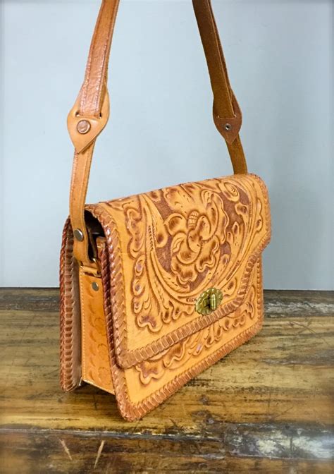 tooled leather purse iucn water