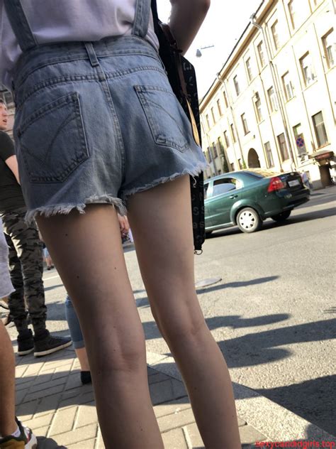 skinny legs in denim shorts city street candid pics sexy