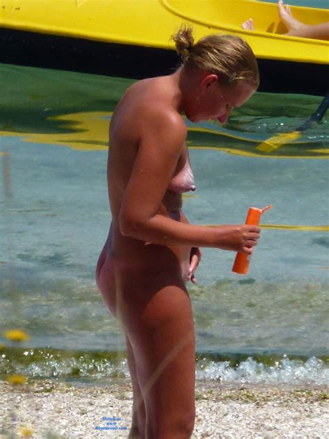 nude girl putting sun screen november 2011 voyeur web