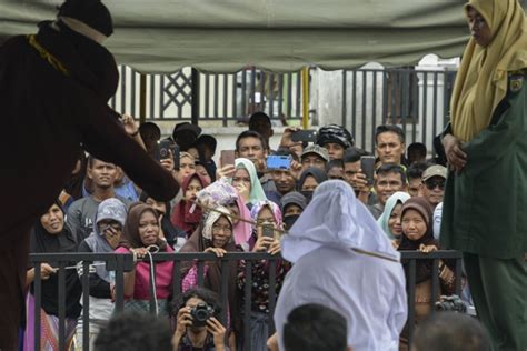 Flogged In Public Two Indonesian Christians Punished For