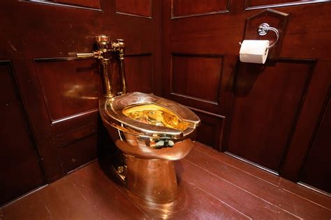 baseball emulsion manger gold toilet guggenheim museum gardien vache