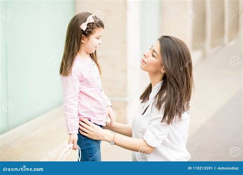 Pretty Latin Mother And Daughter After Shopping Spree Stock Image