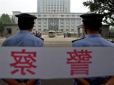 man who set up a fake police station in china exposed after blackmailing girlfriend with secret