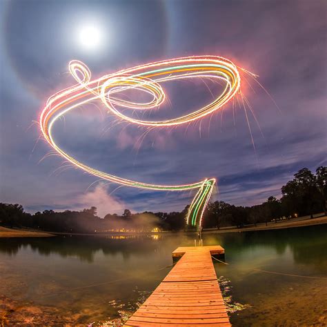 photographer creates colorful long exposure photographs  attaching