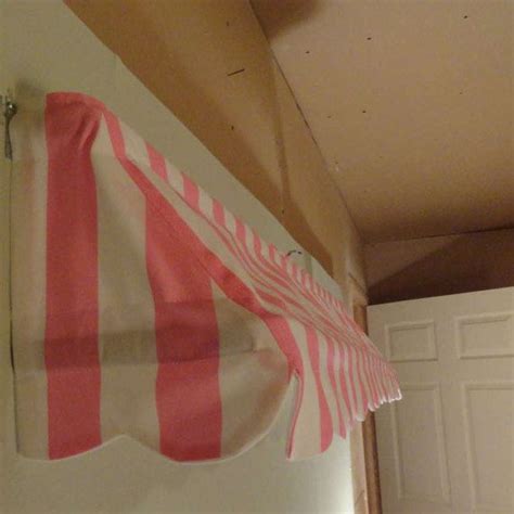 red  white striped curtain hanging   side   door