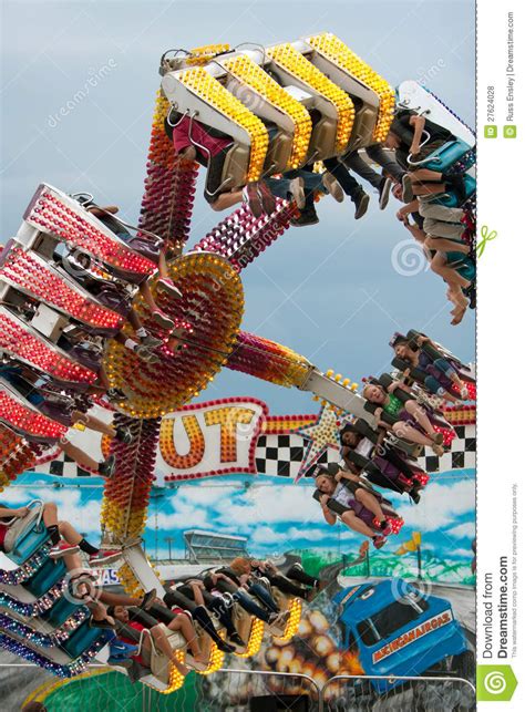 teens have fun on exciting carnival ride editorial stock