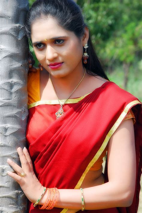 actress geetha pallavi cute in yellow and red half saree