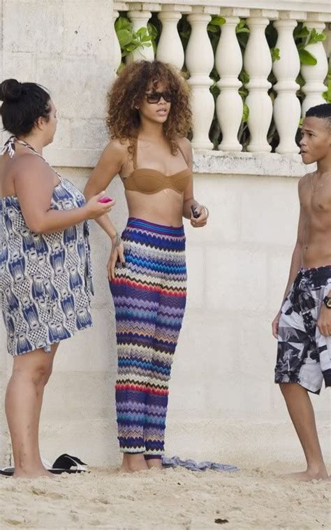 Rihanna Gets Striped In Barbados The Young Black And Fabulous®
