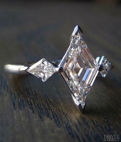 spectacular art deco style lozenge cut diamond engagement ring  glitters pinterest