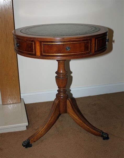 attractive vintage  side table  drawers leather top  wheels