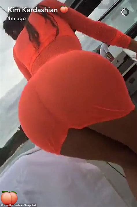 Kim Kardashian Flaunts Her Booty In Clingy Dress As She
