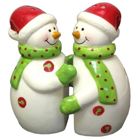 salt and pepper shakers hugging snowman couple holiday