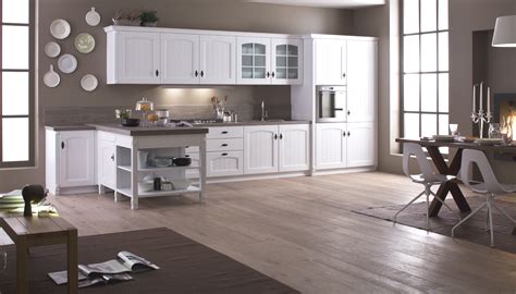 Look out for your first. Lo straordinario effetto delle cucine Arrex in legno colorate di bianco