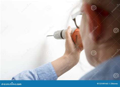 businesswoman drilling  electric power driller stock image image  perforation