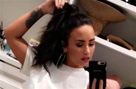 demi lovato flashes some underboob in sexy selfie pic aol entertainment