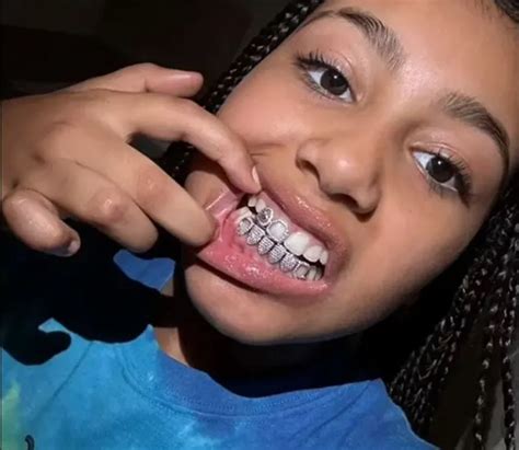 North West Shows Off Her New Diamond Grill In Up Close Selfie