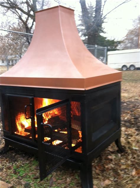 handmade custom outdoor fireplace  kutz fine metalwork