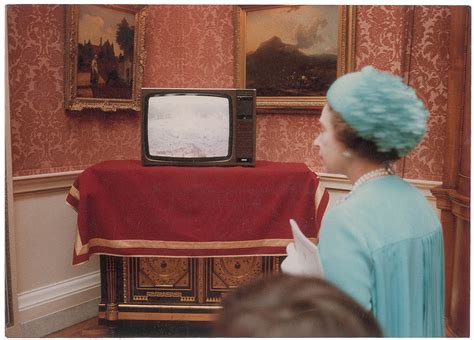 a television inside buckingham palace showed the excitement of the a