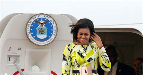 50 memorable michelle obama looks a glance back arriving in japan on