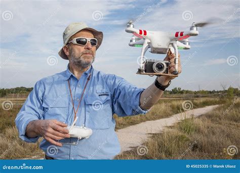 flying quadcopter drone editorial image image  outdoors