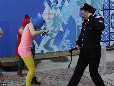 Pussy Riot Members Whipped By Cossacks As They Performed A Protest
