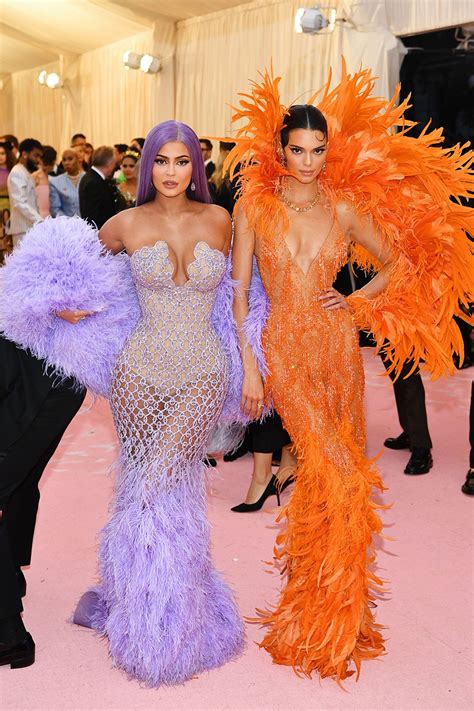 Kylie Jenner And Kendall Jenner Wear Bright Feathers At The 2019 Met