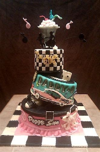 50s themed cake 3 tier complete with peggy sue s poodle skirt a pink cadillac sock hop