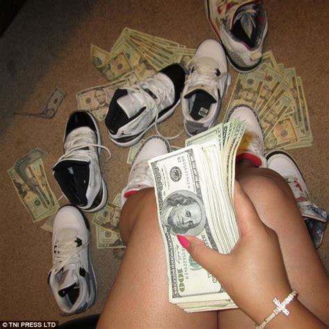 Strippers Pose For Photos With Piles Of Dollar Bills