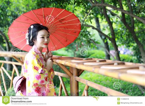 Traditional Asian Japanese Beautiful Geisha Woman Wears