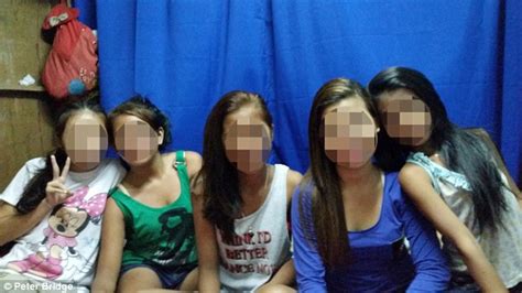 inside filipino cybersex den where paedophiles pick girls