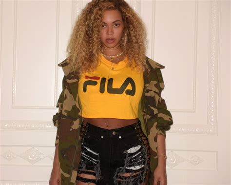 Beyonce Rocks Fila Belly Shirt Ripped Jeans To Kendrick