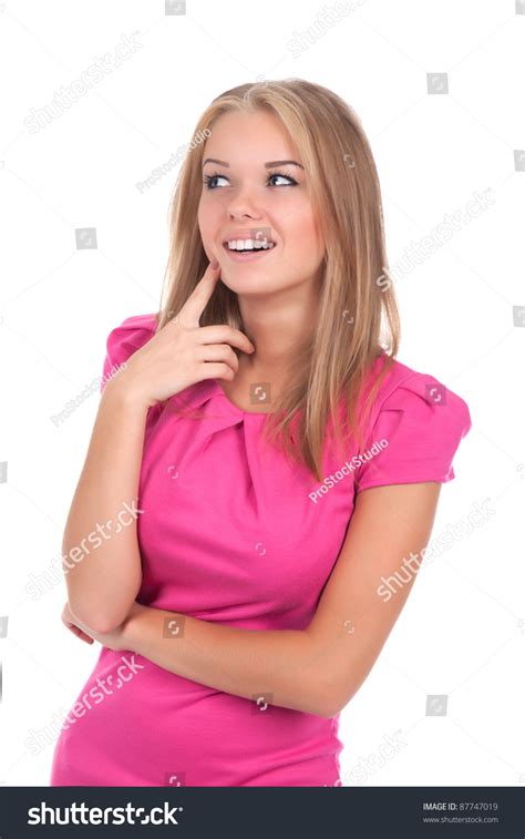portrait of attractive teenage girl smile think looking up in pink