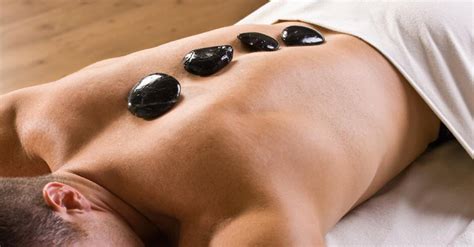 Experience The Benefits Of A Hot Stone Massage To Treat