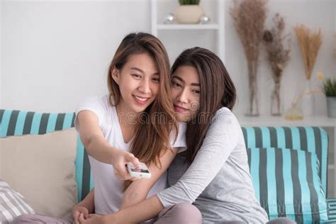 Asia Lesbian Lgbt Couple Holding Remote Watching Tv Show Together Woman