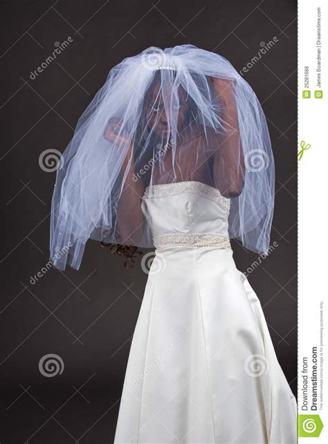 beautiful black woman in a wedding dress royalty free