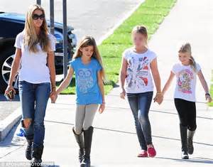 denise richards takes her mind off heartbreak over charlie sheen s twins by taking her daughters