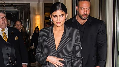 kylie jenner s pinstripe jacket adds sheer pants to