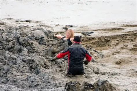 walkers trapped   waist  mud   avoid