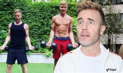 gary barlow take that star s son dan sparks frenzy as they work out together ‘don t look
