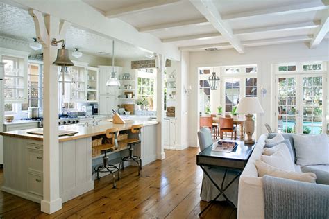 open plan white kitchen  hearth room living space