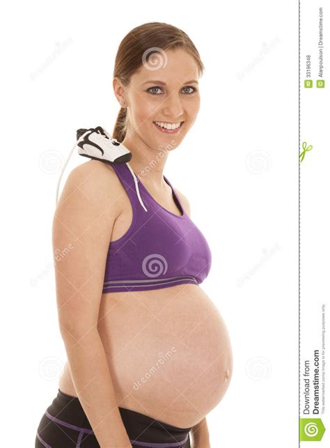 Pregnant Fitness Shoe On Shoulder Royalty Free Stock